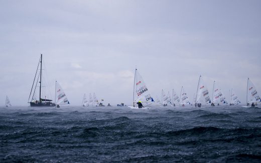 Stormy Skies and Rising Stakes at 2025 ILCA 6 Men’s World Championship in Kiel-Schilksee